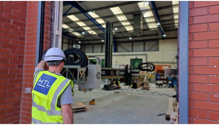 Workman overseeing warehouse