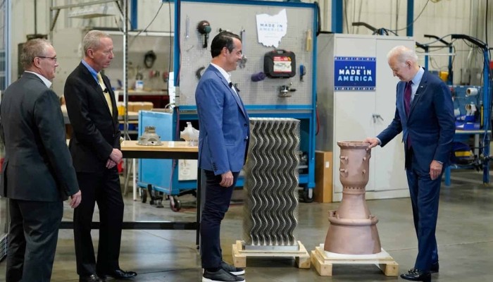 President Biden meets with senior leadership from Sintavia, Lockheed Martin, and Honeywell on May 6, 2022 to discuss the AM Forward initiative, as he inspects manufactured metals.